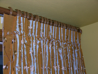 Drapery panels hung with rings